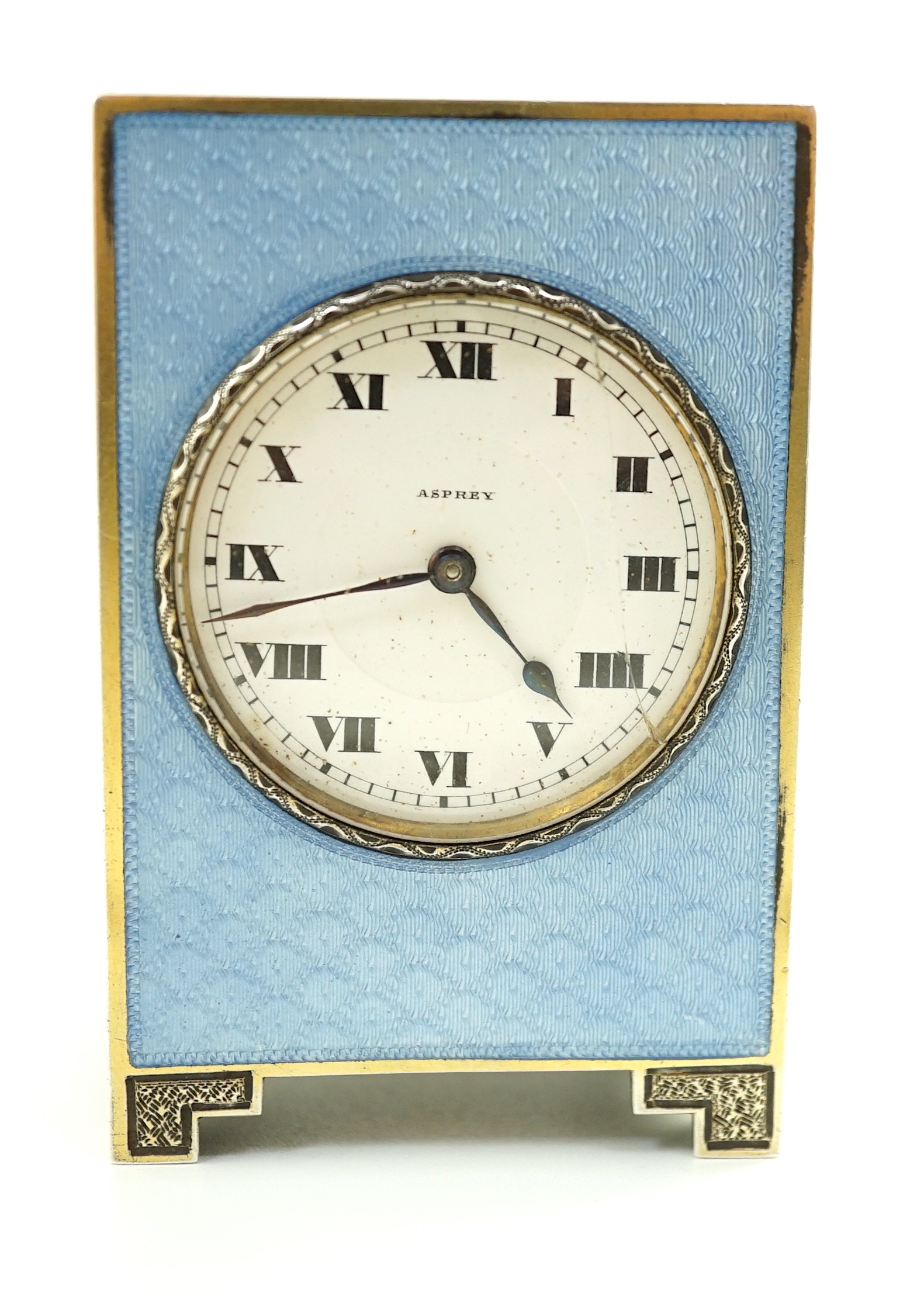 A George V continental silver and blue guilloche enamel miniature timepiece, retailed by Asprey